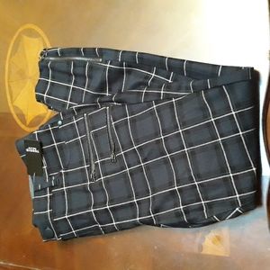 Black and green plaid zip skinny jeans